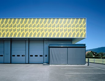 Reifen Fischer - detail of facade with closed shutters