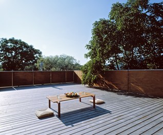 Residence BASE - terrace in the middle of an old stock of trees