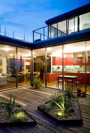Residence M - atrium at night