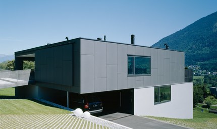 House D - view from northwest with carport