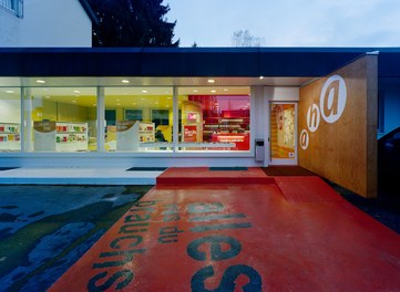 Youth Center AHA - entrance at dusk