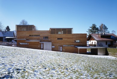 Duplex House Sistrans - east front with car ports