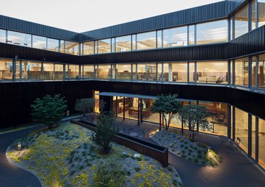 Headquarter Berger Logistik - courtyard at night