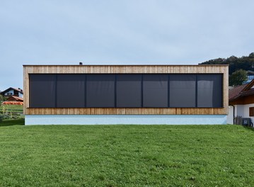 House in Übersaxen - west facade with closed shutters