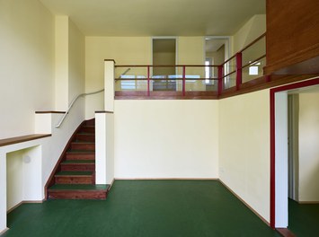 Werkbundsiedlung Restoration - House Loos - two-story living-dining room