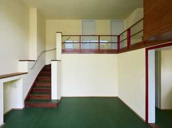 Werkbundsiedlung Restoration - House Loos - two-story living-dining room
