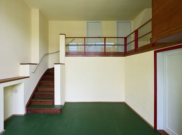 Werkbundsiedlung Restoration - House Loos - two-story living-dining room