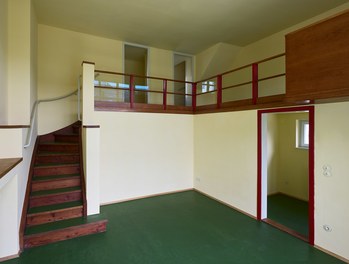 Werkbundsiedlung Restoration - House Loos - two-story living-dining room