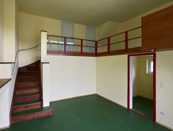 Werkbundsiedlung Restoration - House Loos - two-story living-dining room