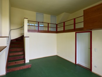 Werkbundsiedlung Restoration - House Loos - two-story living-dining room