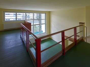 Werkbundsiedlung Restoration - House Loos - two-story living-dining room